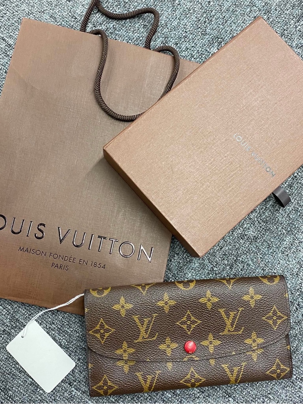 Louis Vuitton Monogram Canvas Wallet in Brown with Red Snap